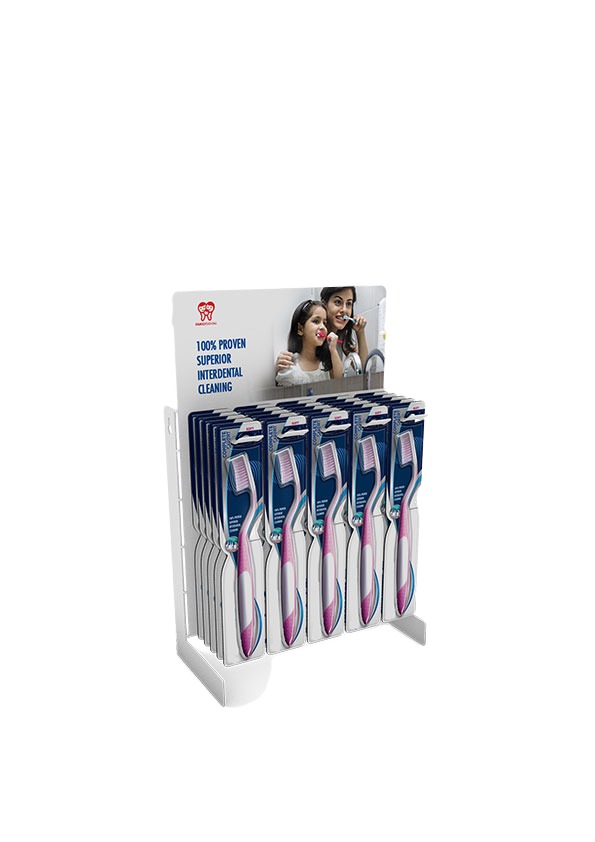 Compact ORIGAMI display with rows of hanging toothbrush packs and a header panel